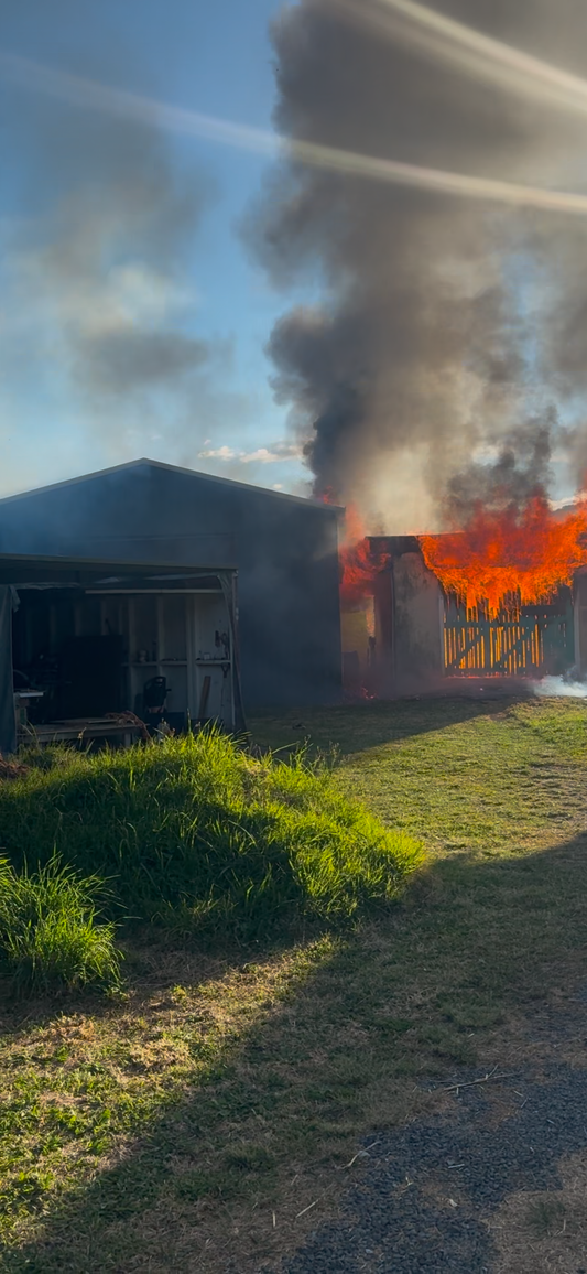 A big fire burning down a garage