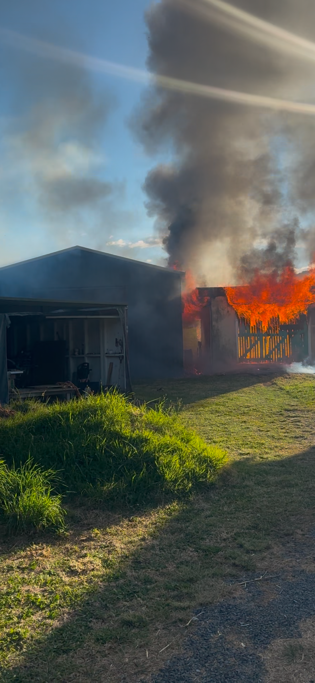 A big fire burning down a garage